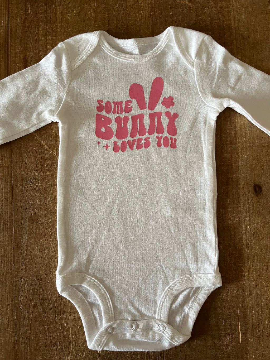Some Bunny Loves You Pink Baby Bodysuit