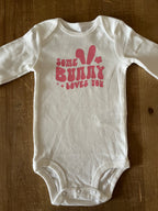 Some Bunny Loves You Pink Baby Bodysuit