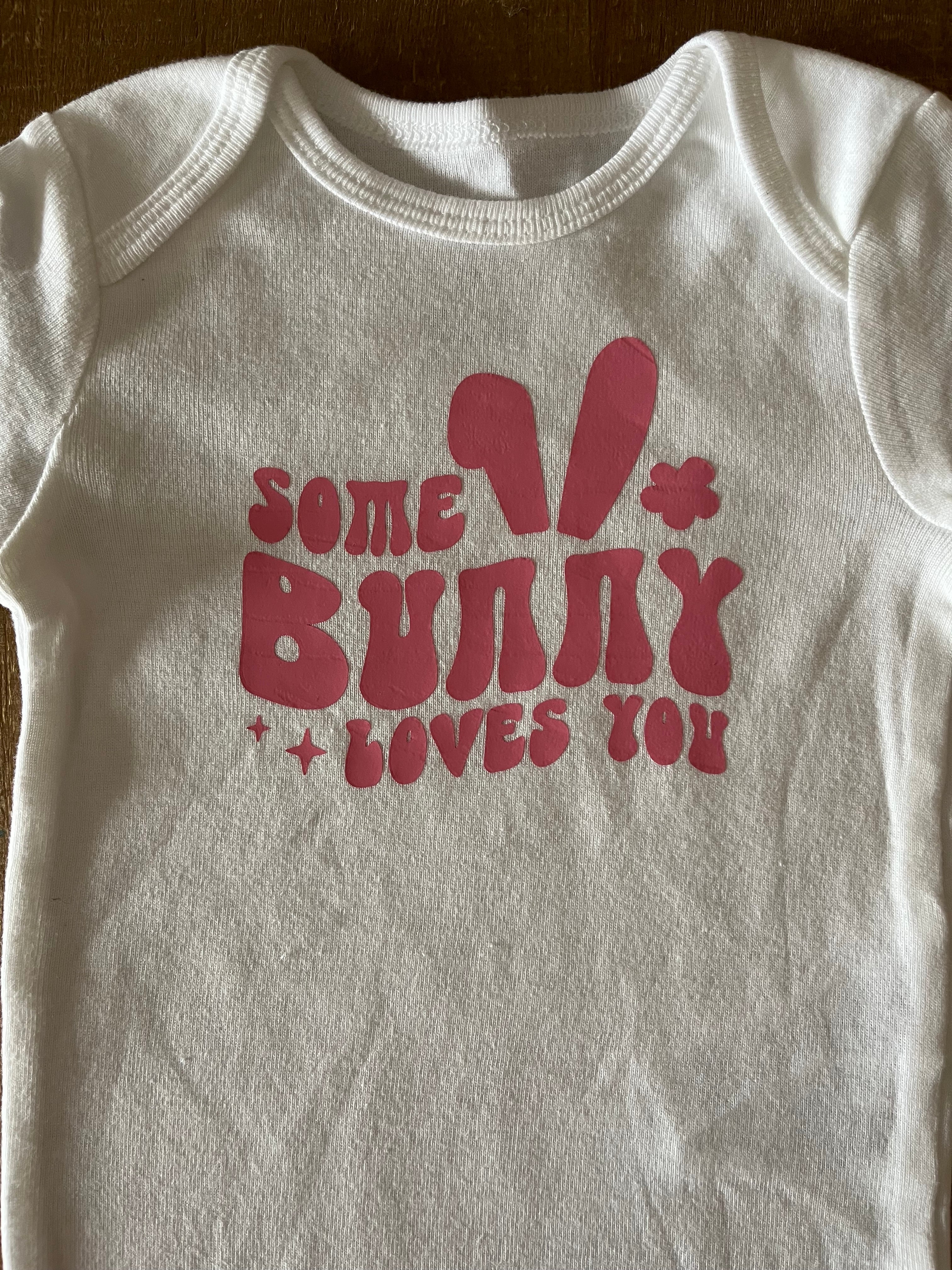 Some Bunny Loves You Pink Baby Bodysuit